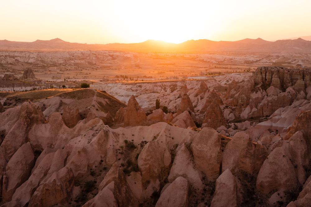 Sunset over the bizarre landscape of Red Valley in Cappadocia