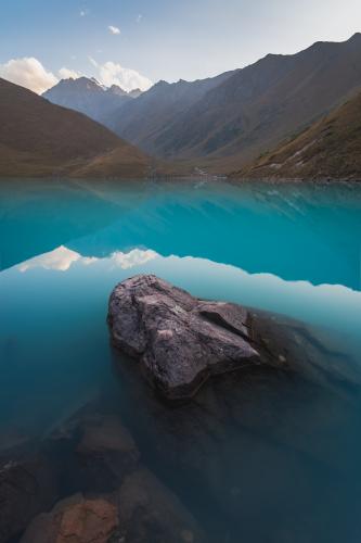 Incredible turquoise lake of Kol Tor at sunset, Kyrgyzstan