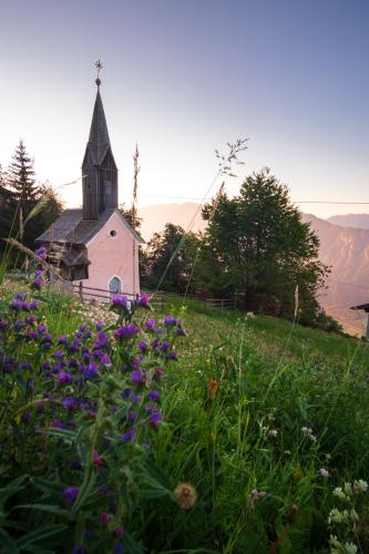 Pink church, Carinthia, Austria