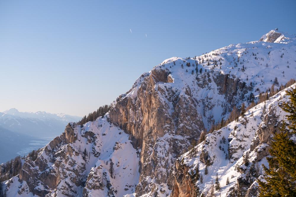 Snowy Dobratsch and it's tiny Church, Austria