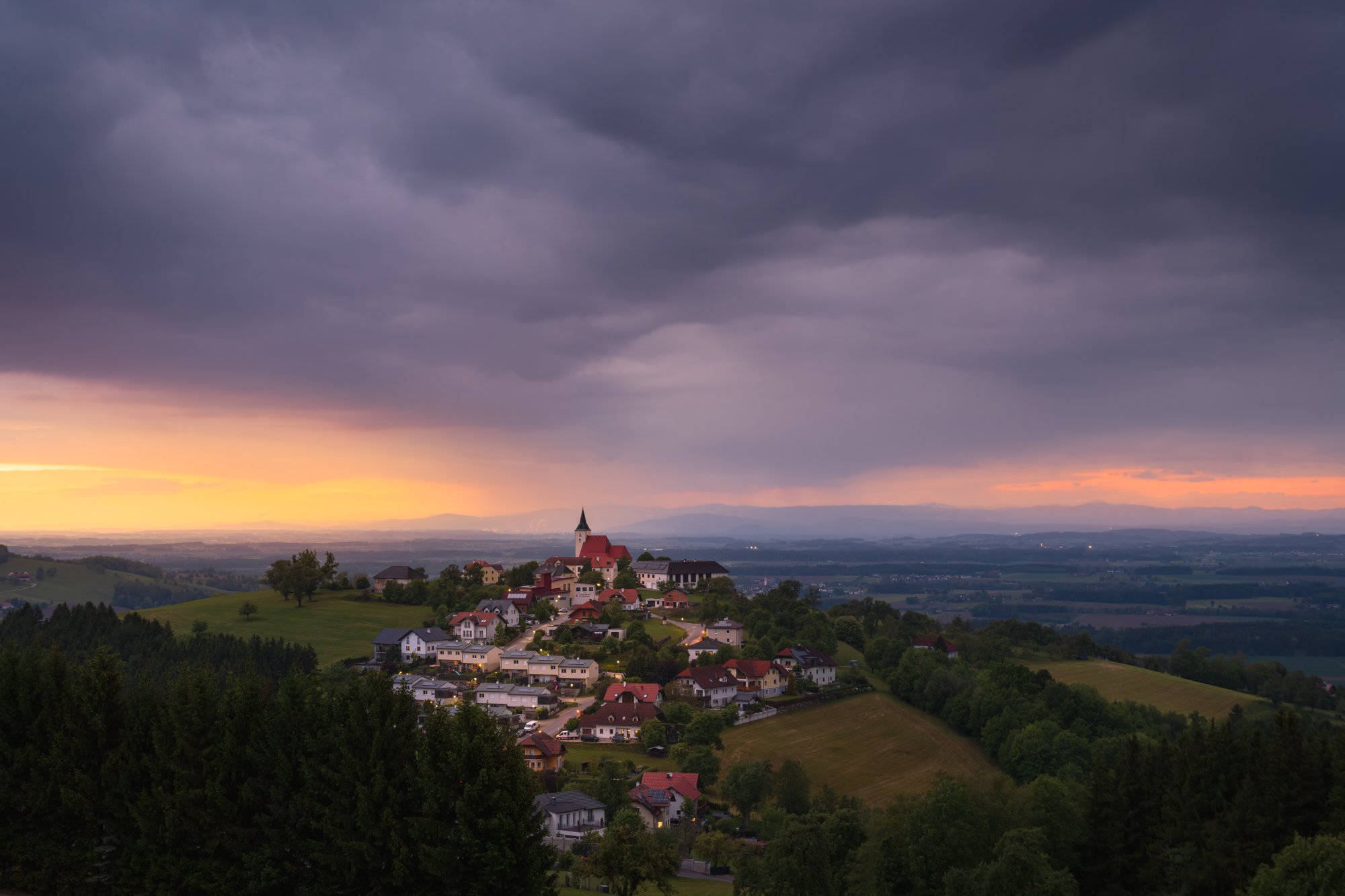 Stormy spring sunset over St. Michael, Mostviertel, Austria